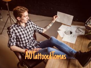 A0TattooedTomas